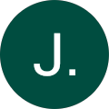 J.