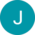 J E